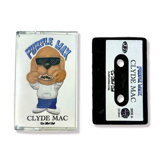 Black skate wax cassette tape. Clyde Mac Edition. Premium skateboard wax. Comes in a cassette case, with Purple Wax tape cover.

Purple Wax - 3rd Coast Skate Wax - Out the Mud Since 2014 - Skateboard Wax and Apparel