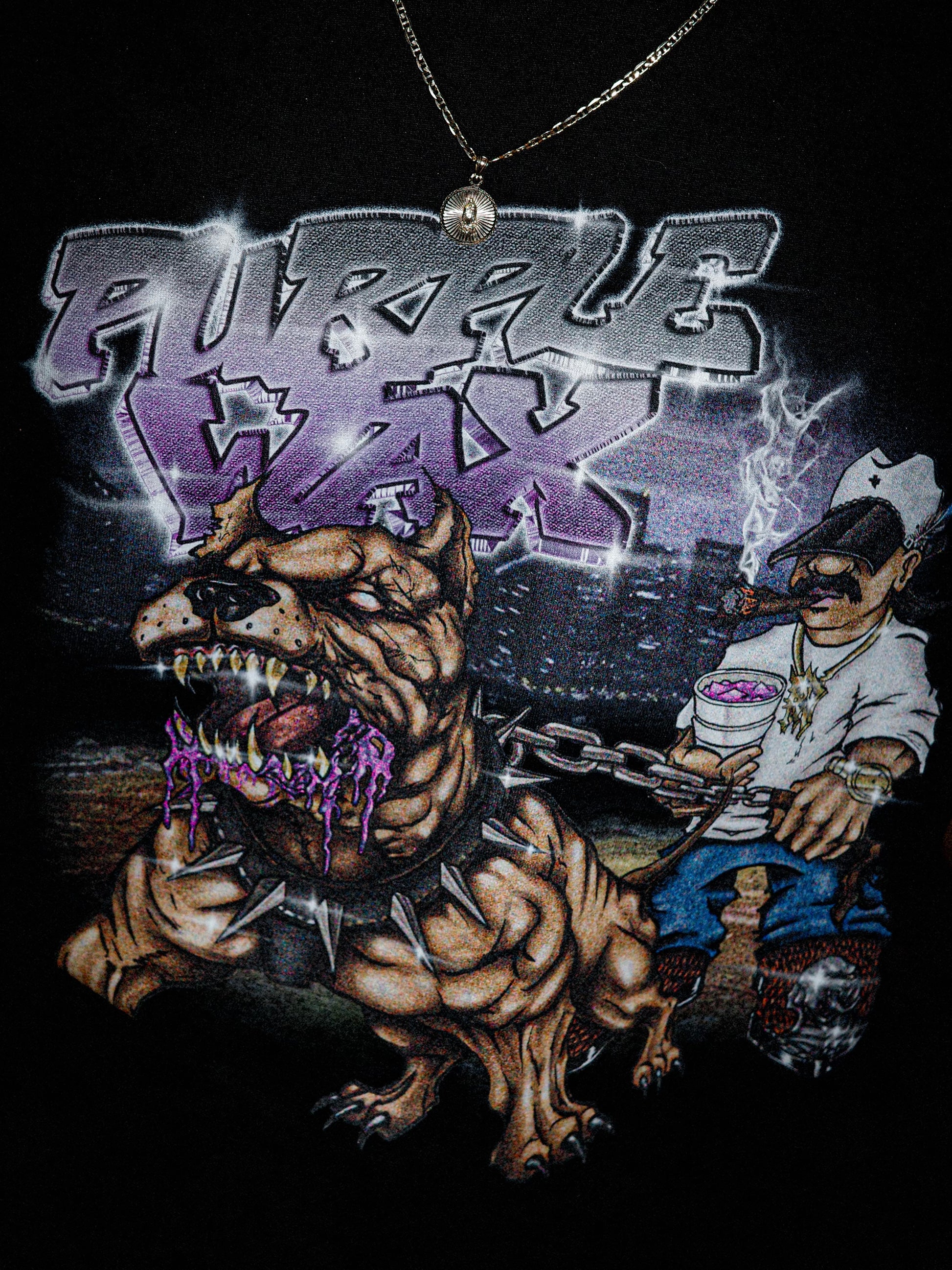 Black t-shirt with full color graphic printed on the front. The graphic is a dude walking his pit bull, and holding a double cup. The pit bull has gold teeth, and Purple Wax looking drool. Purple Wax logo is shining at the top. Graphic made by Fiend. 

Purple Wax - 3rd Coast Skate Wax - Out the Mud Since 2014 - Skateboard Wax and Apparel